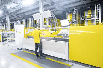 Ergonómikus Pick to Tote komissiózó állomás a Suning-nál