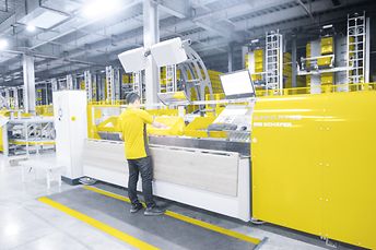 Ergonómikus Pick to Tote komissiózó állomás a Suning-nál